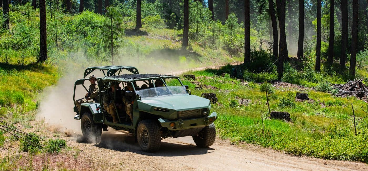 Idaho Army National Guard Infantry Squad Vehicle on a forest road, photo by Rusty Rehl