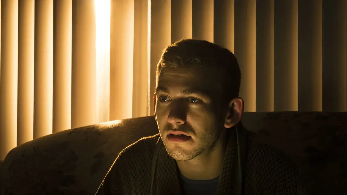 Jayson Golden, moody window-light portrait by Boise, Idaho photographer Rusty Rehl