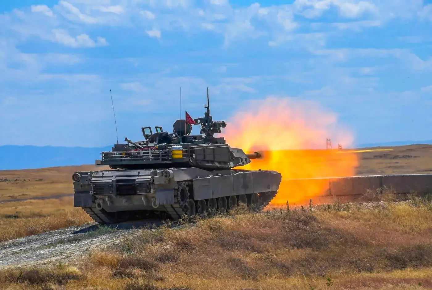 Idaho Army National Guard M1 Abrams tank firing its main gun, photo by Rusty Rehl